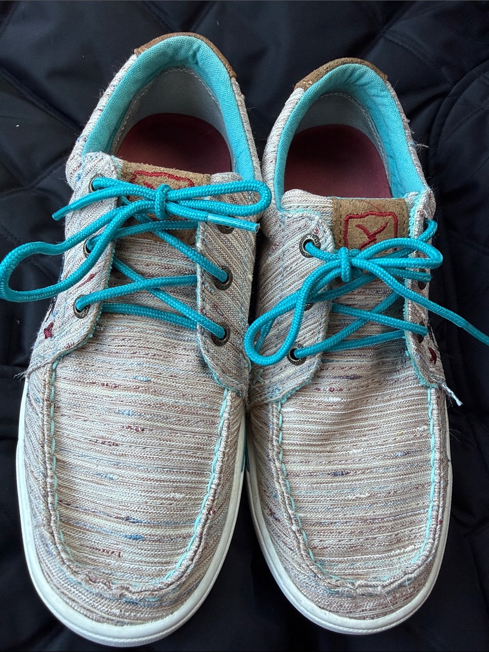 Casual Canvas Lace-Up Twisted X with Teal Accents.